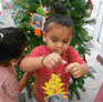 Little Dalrling Childcare decorating Christmas tree