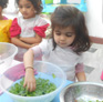 Little Dalrling Childcare washing vegetables